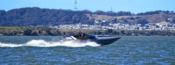 The Small Fast Harbor Craft, renamed to the FCV Vanguard, operating on the water