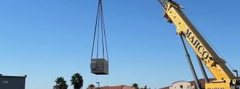 Amber Kinetics container being lowered on its pad at the RICU