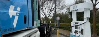 Hydrogen truck being fueled at a public station.